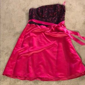 A Fuchsia and black strapless dress
